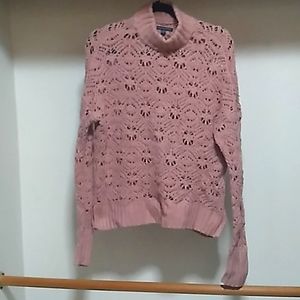 Women's pink sweater.